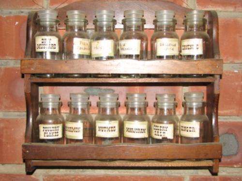 Spice rack with original spice bottles
