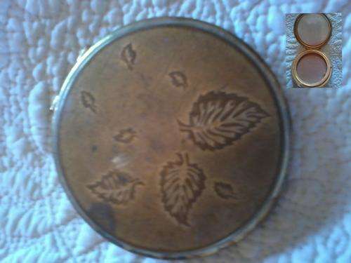 Powder compact