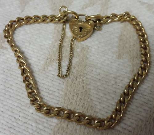 STUNNING LADIES 9CT GOLD BRACELET WITH HEART LOCK
