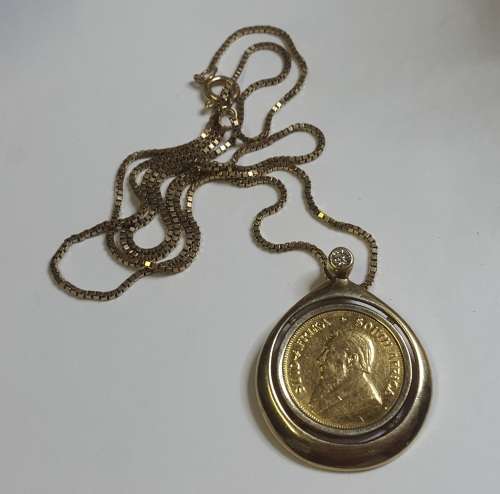 STUNNING 1/10TH KRUGER COIN IN PENDANT WITH DIAMOND ON 9CT GOLD CHAIN STUNNING
