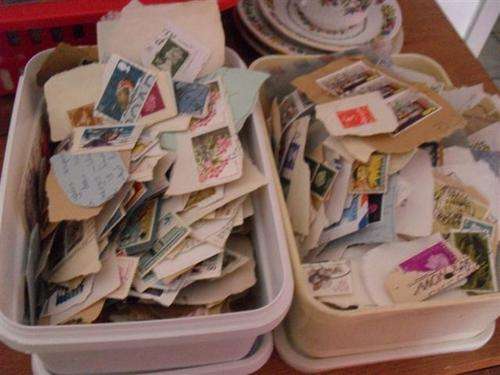 2 X ICECREAM TUBS OF MIXED WORLD STAMPS (ON AND OFF PAPER )