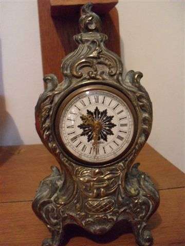 MERCEDES (WEST GERMANY ) ORNATE BRASS CLOCK...SEE CONDITION.....