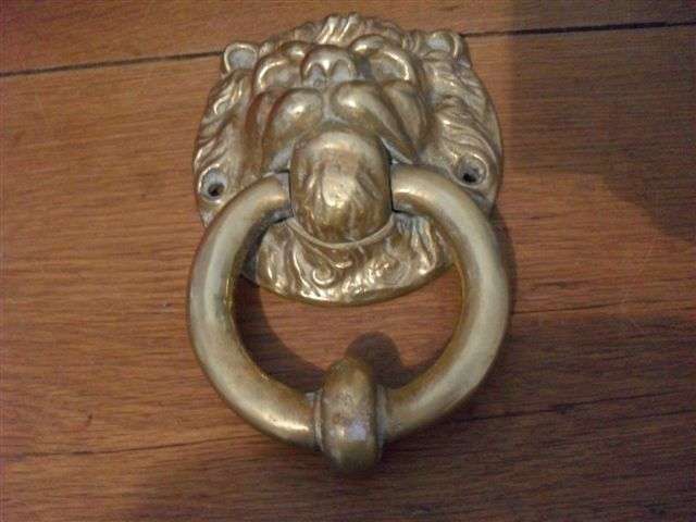 HEAVY BRASS LION FACE DOOR KNOCKER.....