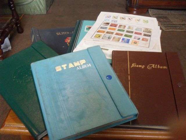4 ALBUMS 1 PRE PRINTED ALBUM 106 LOOSE PAGES WORLD STAMPS....