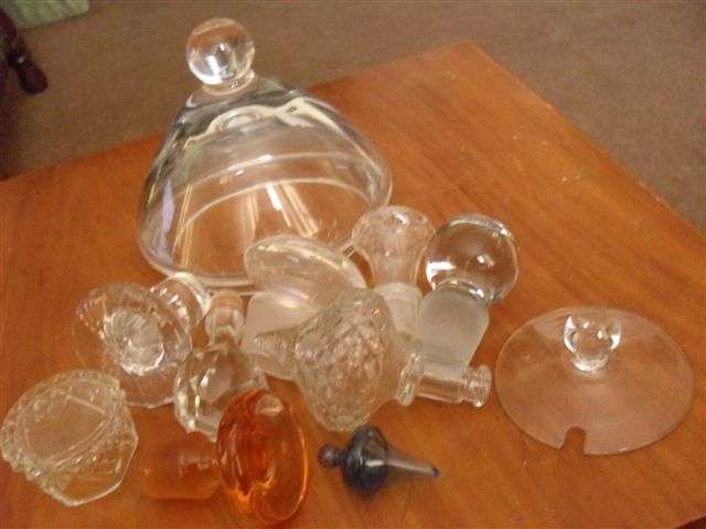 SOME CRYSTAL STOPPERS FOR DECANTERS AND OTHER GLASS LIDS......