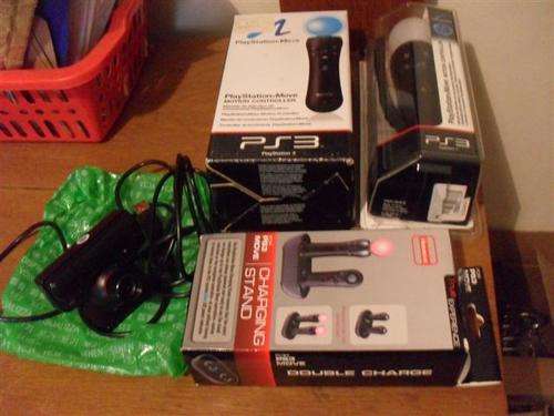 2 X PS3 MOVE CONTROLLERS AND DOUBLE DOCKING STATION AND PS3 EYE/CAMERA