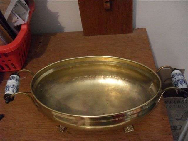 LOVELY  4 FOOTED BRASS DISH WITH BLUE & WHITE PORCELAIN  HANDLES....