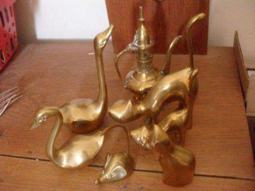 A COLLECTION OF SOME BRASS ORNAMENTS....
