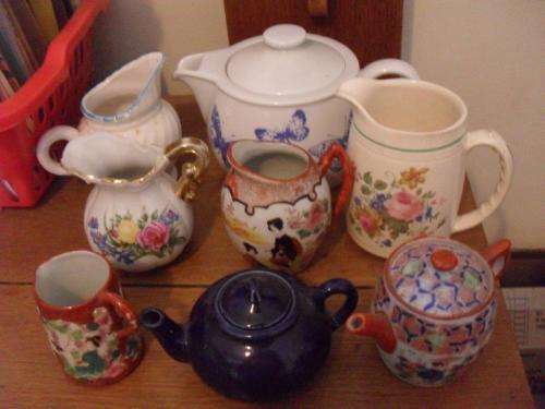 SOME TEAPOTS AND MILK JUGS.....