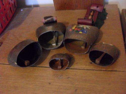 A COLLECTION OF COW BELLS