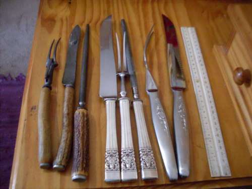 A COLLECTION OF VINTAGE CARVING  SETS...SEE PICS