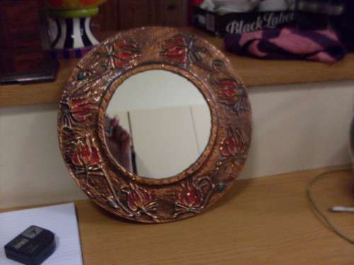 A LOVELY ROUND COPPER WITH ENAMELLED FLOWER DESIGN MIRROR READY TO HANG