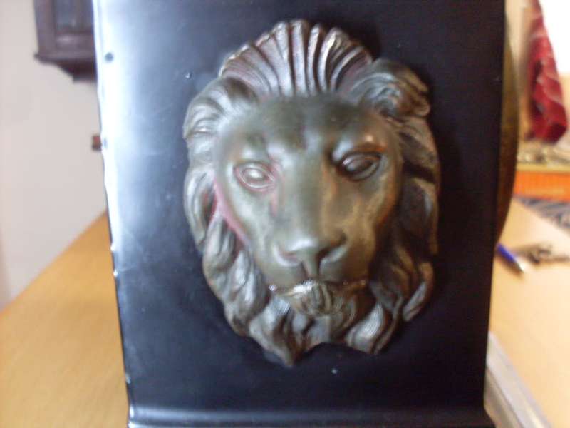 WOW ORIGINAL VINTAGE ANSONIA BLACK CAST IRON MANTLE CLOCK/ALSO HAS CAST LIONS ON THE SIDES...9.3 KG