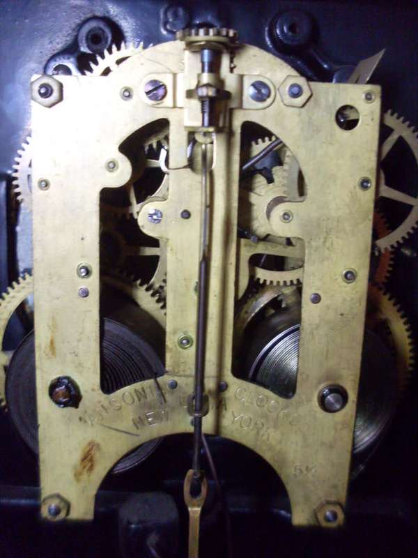 WOW ORIGINAL VINTAGE ANSONIA BLACK CAST IRON MANTLE CLOCK/ALSO HAS CAST LIONS ON THE SIDES...9.3 KG