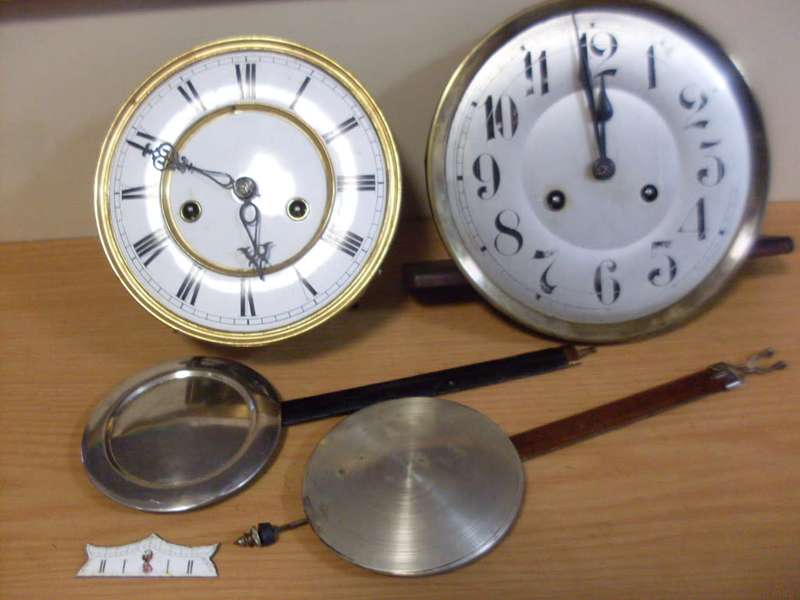 2 MECHANISMS FOR WALL CLOCKS...WITH PENDULUMS...SEE DESCRIPTION