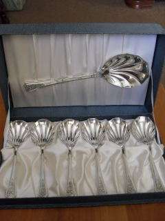 LOVELY !!!!! BOXED 7 PIECE SPOON SET ((EPNS))