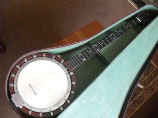 A GALLOTONE((BRITISH MADE )) BANJO IN A CARRY CASE !!!!!!!!