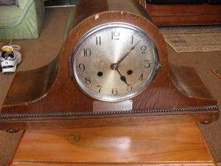 A RARE GERMAN MANTLE CLOCK (MARKINGS IS A CLOCK FACE WITH WINGS !!! ))