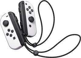 NINTENDO SWITCH OLED MODEL ( BLACK AND WHITE ) EXCELLENT CONDITION + JOYCON GRIP AND WRIST STRAPS