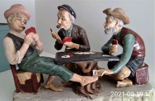 CARD DEALER FIGURINE