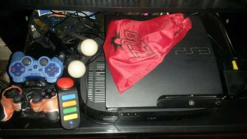 Playstation 3 with 60 Games and extras