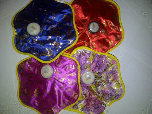 ELECTRIC HOTWATER BOTTLES....HEATS UP IN 7 - 12 MINUTES