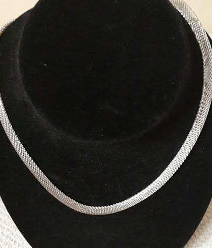 Brand new silver hollow mesh necklace