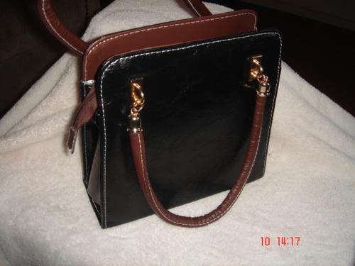 Stunning black handbag with brown handle