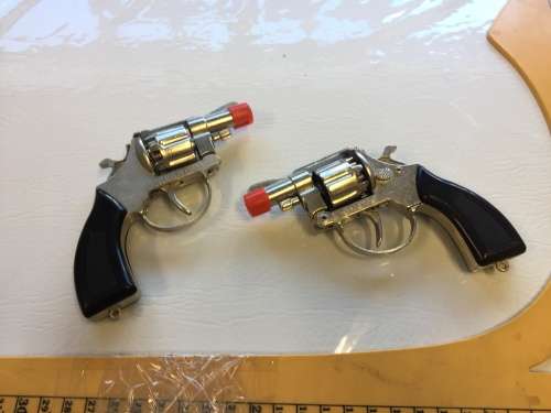 2 die cast revolvers