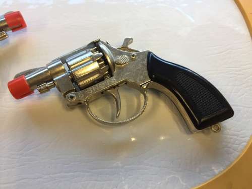 2 die cast revolvers