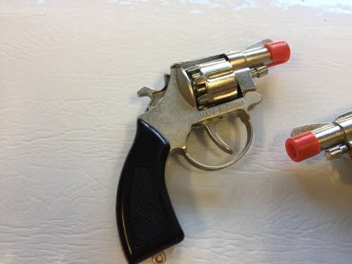 2 die cast revolvers