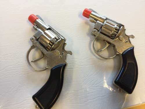 2 die cast revolvers