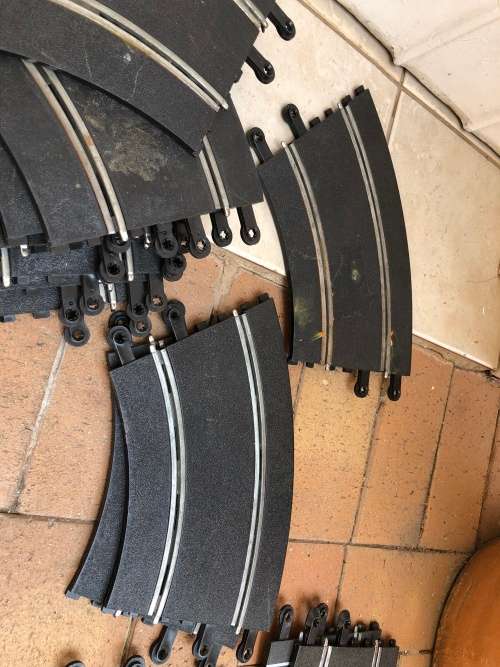 Scalextric tracks with power unit and controllers