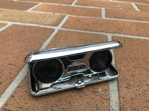 Vintage looking binoculars that fold up