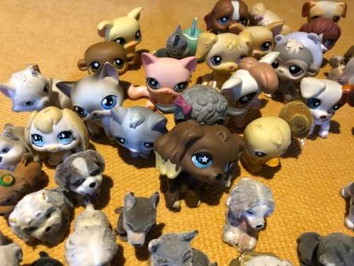 large collection of collectable mini dog figures for playing or collection - approx 60