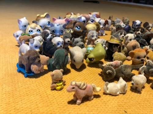 large collection of collectable mini dog figures for playing or collection - approx 60