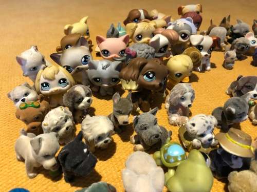large collection of collectable mini dog figures for playing or collection - approx 60
