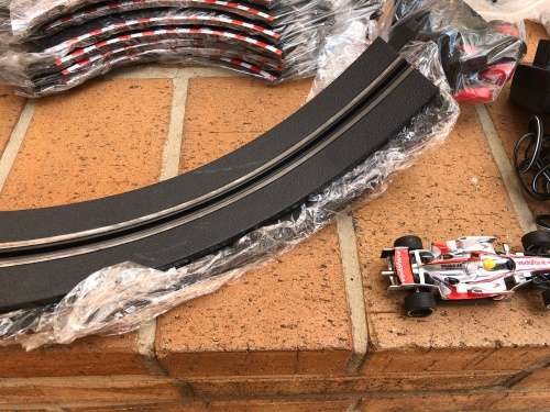 Lovely Carerra slot car set - track, cars and charger
