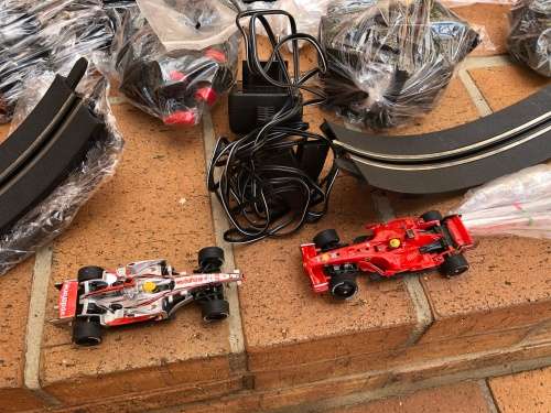 Lovely Carerra slot car set - track, cars and charger