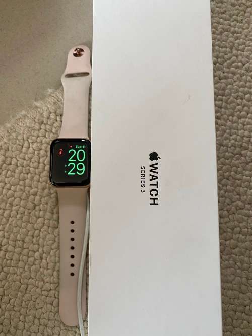 Apple Series 3 Watch with charger switches on but has crack on screen - spares or usage - not tested