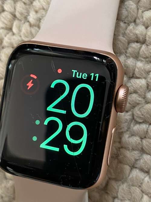 Apple Series 3 Watch with charger switches on but has crack on screen - spares or usage - not tested