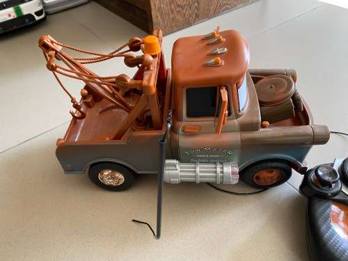 2 RC CARS truscks and a remote - untested