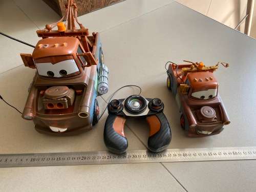 2 RC CARS truscks and a remote - untested