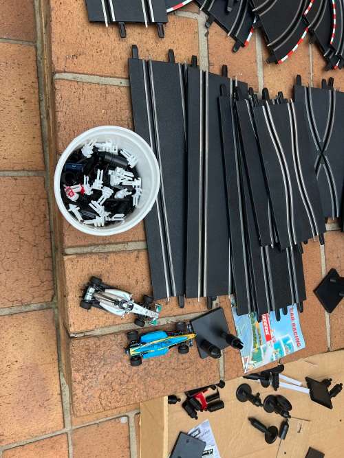 Very large Carrera scalextrix set with 4 cars and many extras