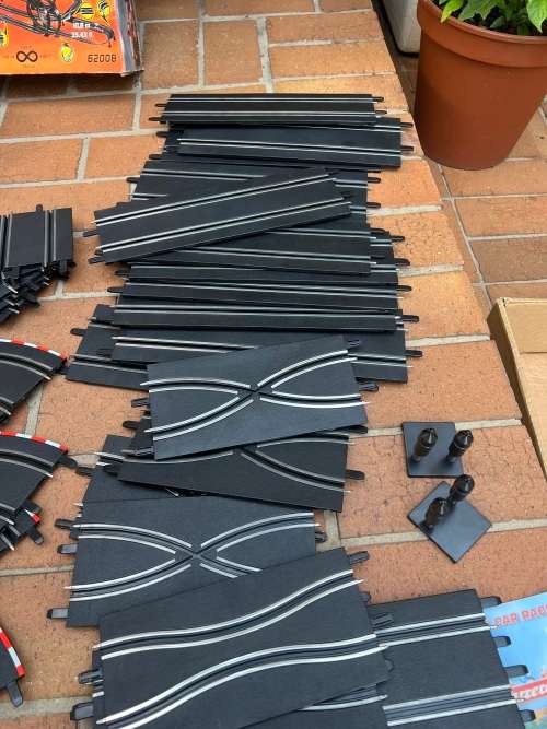 Very large Carrera scalextrix set with 4 cars and many extras