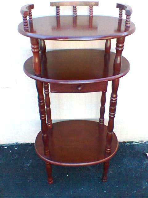 A BEUTIFUL 3 TIER WITH DRAW TABLE AND EDGE RAIL AROUND THE TOP , ON 4 LEG'S IN EXCLENT CONDITION