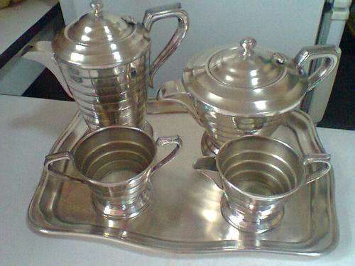 A 1920's SECRANCO Tea SET Plus Matching Tray.In good condition for it's Age needs a good clean.