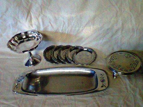A Job Lot of Silver Plated Items.A Trivert stamped"B.N.Ltd EPNS"Bread Server,Bonbon Dish,6xCoasters