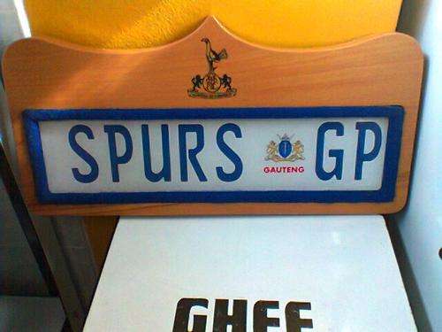 A Outstanding " SPURS " Sign mounted on Beach Wood with Emblems. 48 cm Long x 24.5 cm Wide