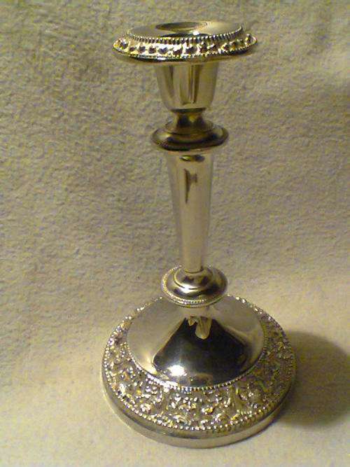 A Old Vintage very Heavy Ornate Single Candlestick Plated for that romantic evening